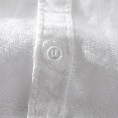 Men's light blue short sleeve linen blend casual shirt with a loose fit.