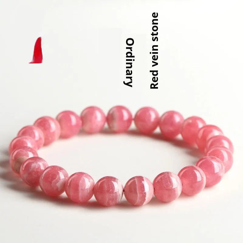 Women's geometric crystal bracelet with red rhodochrosite stones and longevity lock clasp, showing bead size options