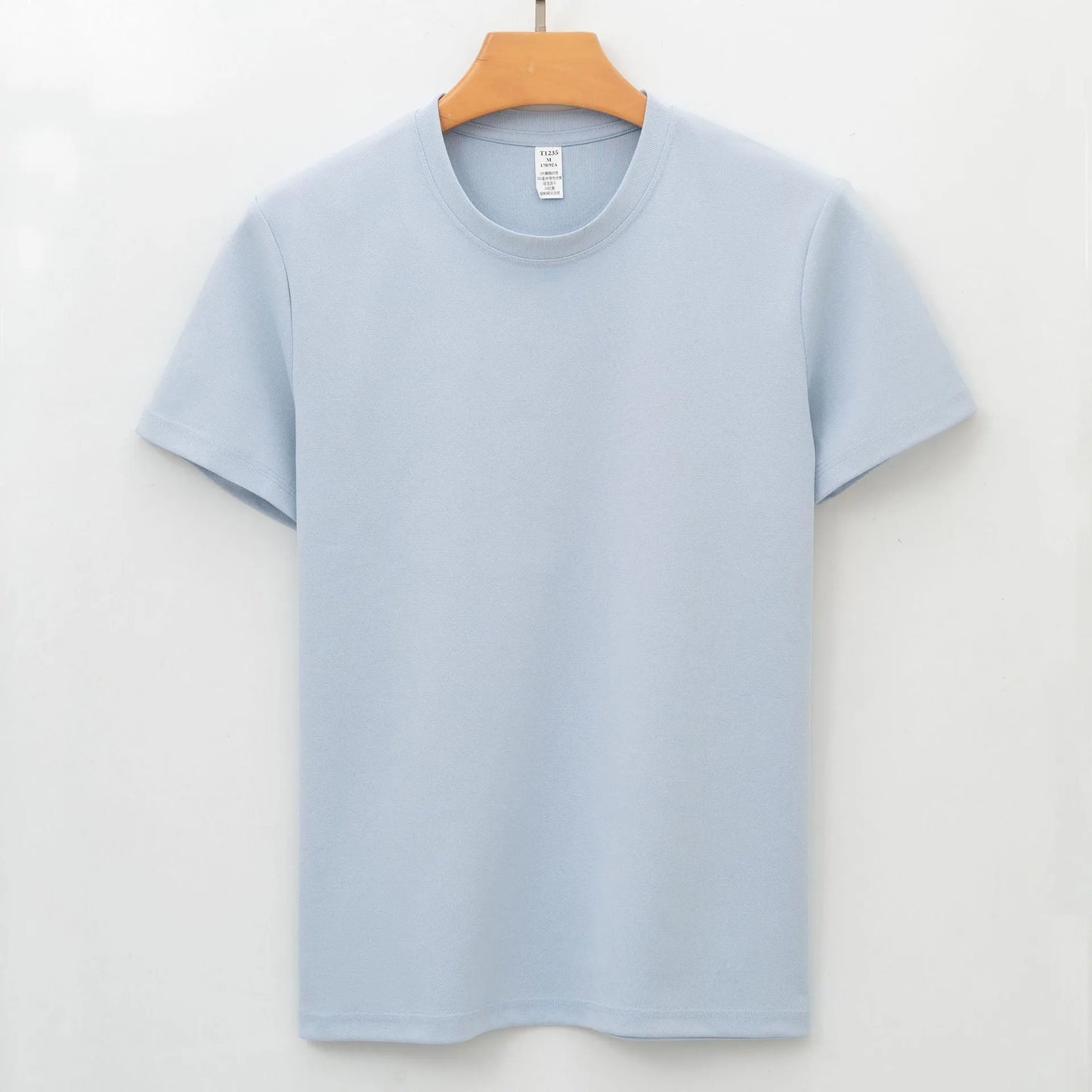 Men's solid colour antibacterial quick-dry short sleeve T-shirt on a hanger.