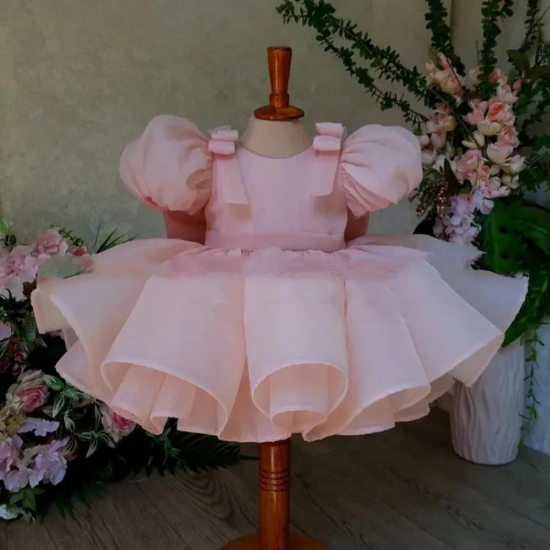 Flower girl dress with puffy sleeves and princess bow design for special occasions, available in nine height sizes from 66cm to 140cm with polyester fabric construction