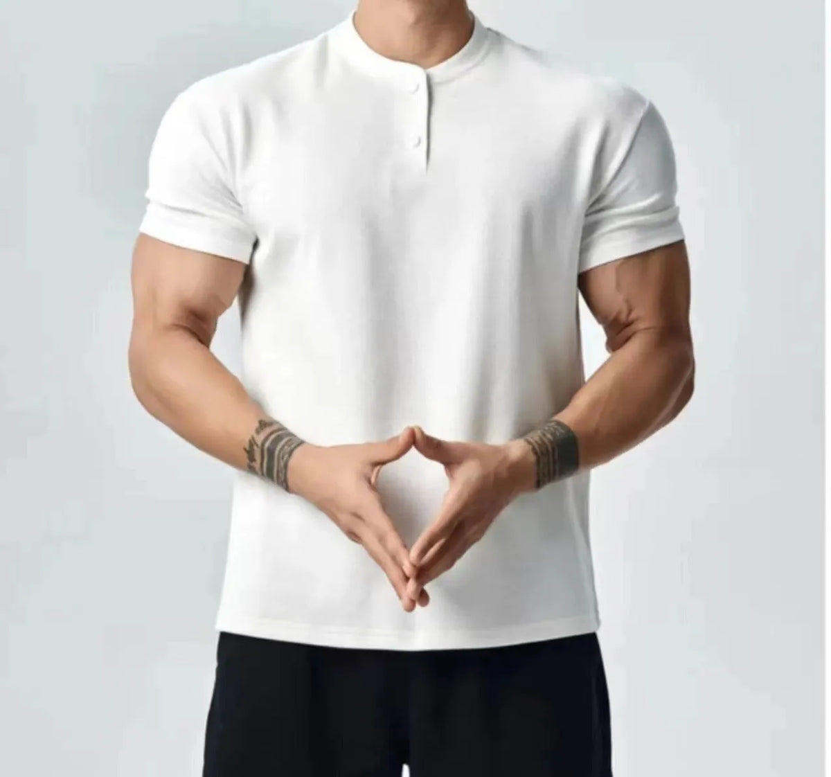 Men's loose fit retro T-shirt shown in black with a Henry collar on a mannequin.