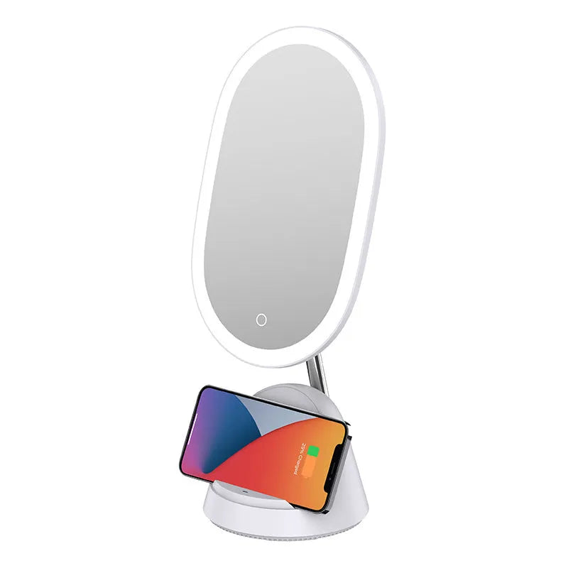 White adjustable LED desk lamp with integrated circular makeup mirror on a desk.