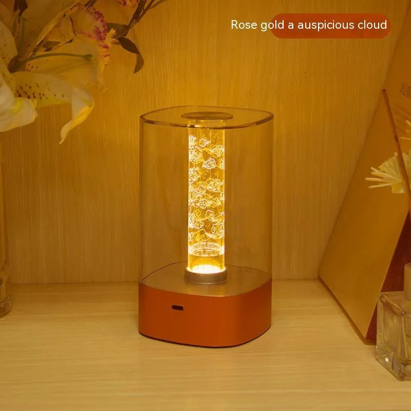 Rose Gold LED touch atmosphere lamp with abstract pattern on bedside table