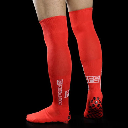 Anti-slip dispensing knee-length football socks in polyester, available in ten colours including black, white, red, and blue.