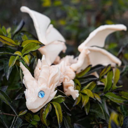 Red and gold 3D printed plastic dragon wings decoration for costumes.