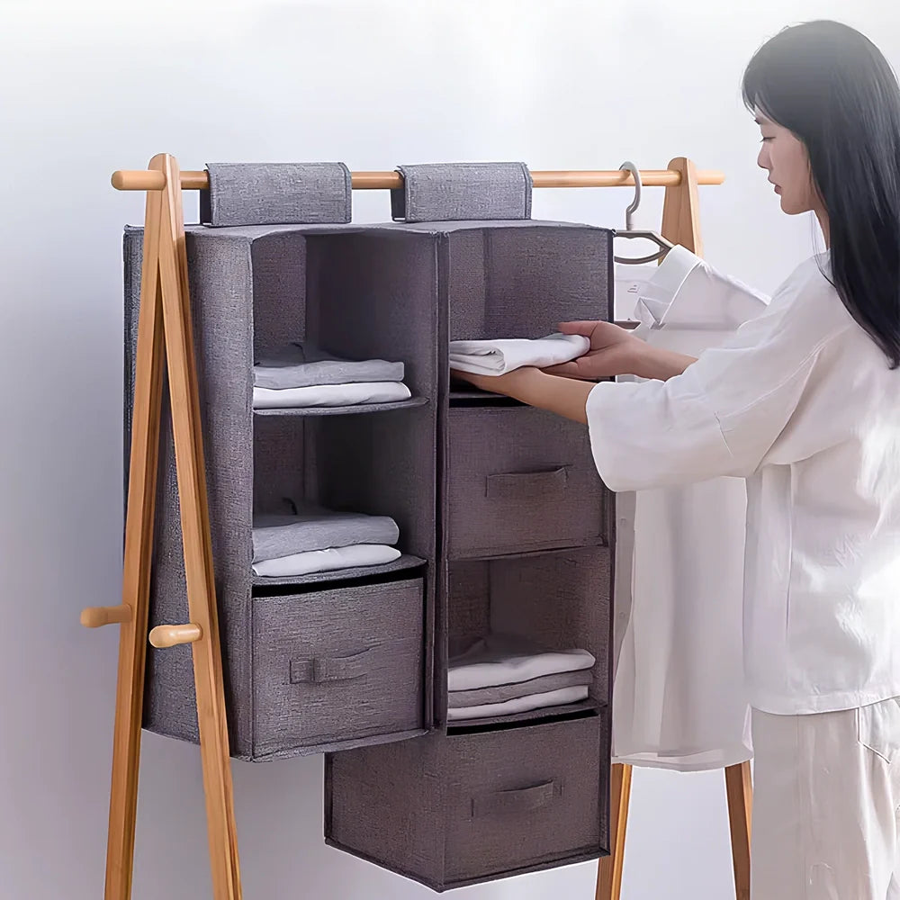 Cotton hanging storage bag with multiple drawers measuring 24.6cm each