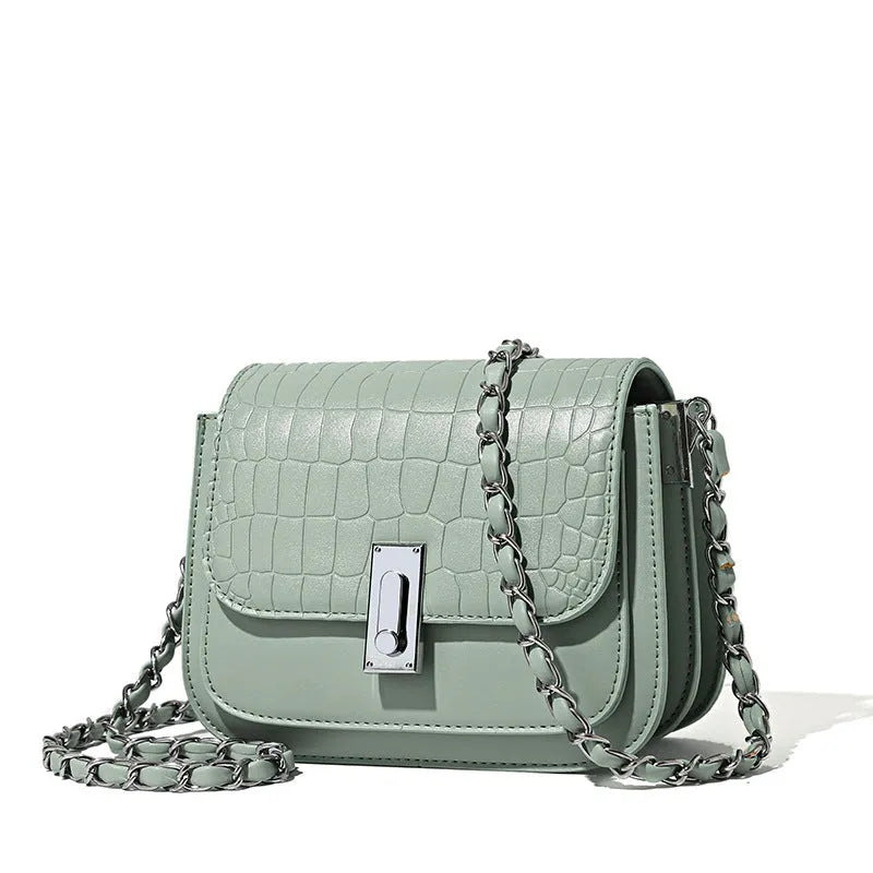 Women's soft PU shoulder bag with chain strap, horizontal square design in black colour showing sandwich pocket