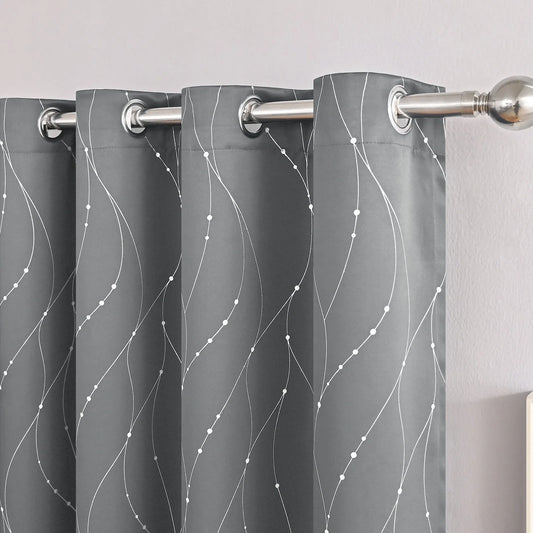 Modern minimalist blackout curtain in dark grey showing pre-punched header and light-blocking fabric texture