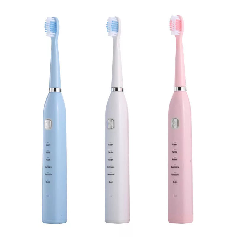 USB Charging Electric Toothbrush in White, Pink, and Blue with 4 Replacement Heads