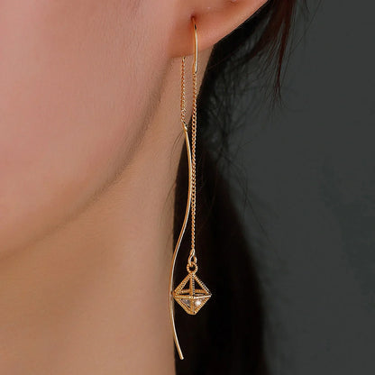 Gold Bronze Cutout Zircon Tassel Earrings with sparkling stones and intricate design