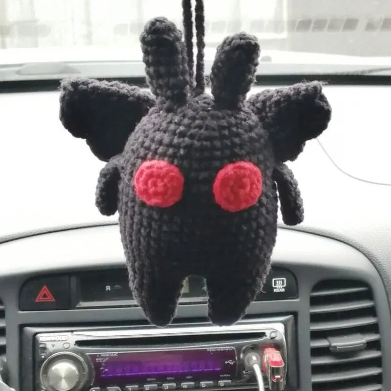 Soft, hand-woven plush car hanging ornament in a cartoon character design.