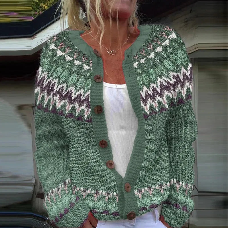 Yellow women's cardigan coat with a raised 3D digital print pattern, shown on a hanger.