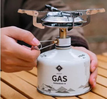 Compact outdoor portable gas stove with disk-type furnace head for efficient cooking