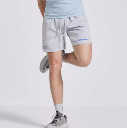Men's training fitness shorts in blue, black, gray or white with moisture-wicking fabric