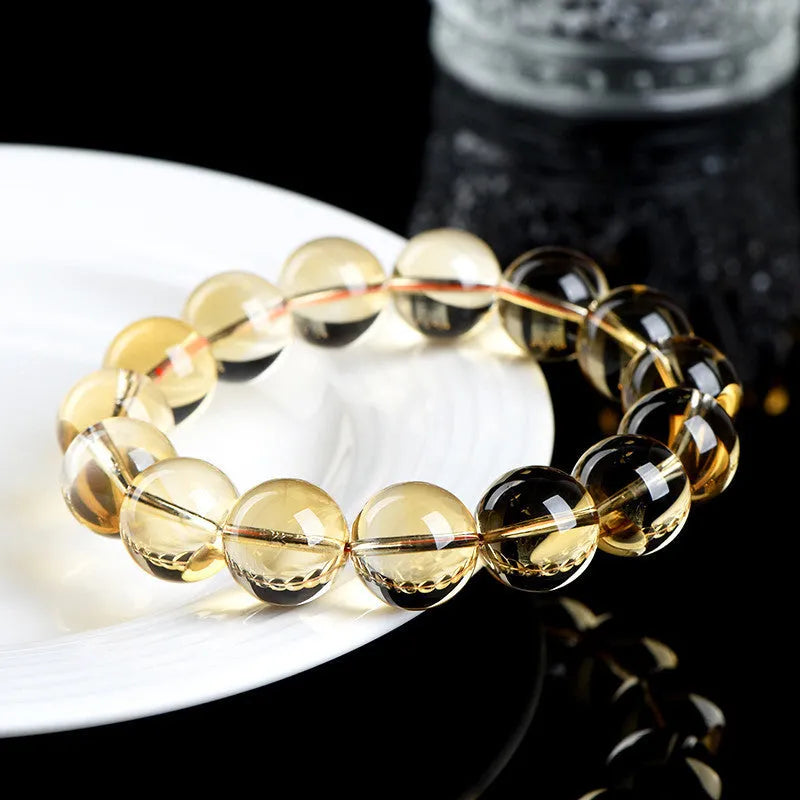 Natural citrine scattered beads bracelet showing adjustable design with polished gemstone beads in amber tones