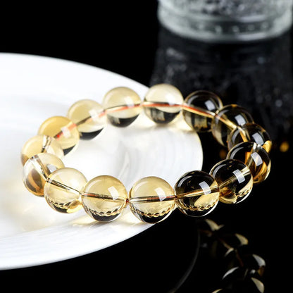 Natural citrine scattered beads bracelet showing adjustable design with polished gemstone beads in amber tones