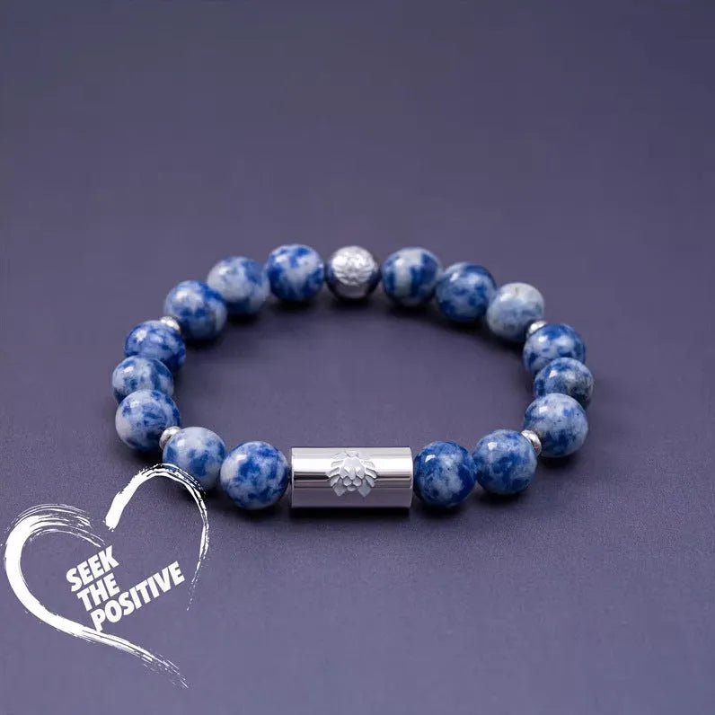 Black and white Qiankun bodhi seed ethnic bracelet with geometric shapes on wrist