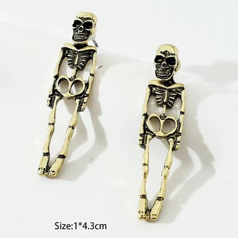 Halloween skull stud earrings in gold and silver, detailed design, lightweight alloy