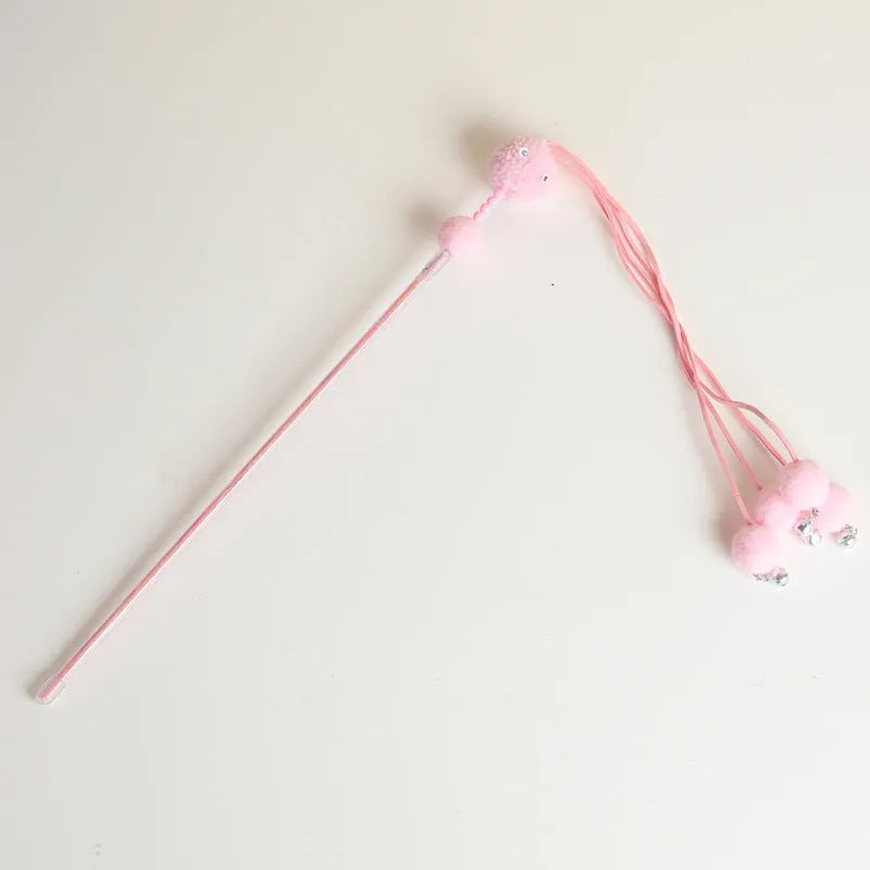 Funny cat stick toy with colourful feather tassel on elastic cord, shown in blue, pink, and purple options.