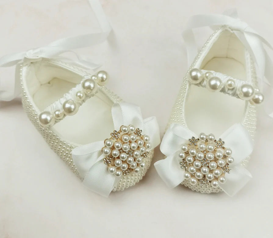 Handmade milky white cloth shoes with lace-up closure and matching fabric headband