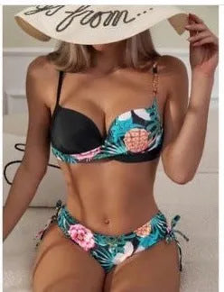 Women's two-piece bikini swimsuit with push-up padding and drawstring design in printed polyester fabric