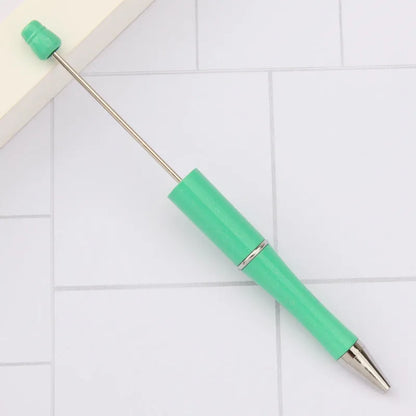 Rotating bead ballpoint pen in gradient colour with ABS plastic and steel wire construction