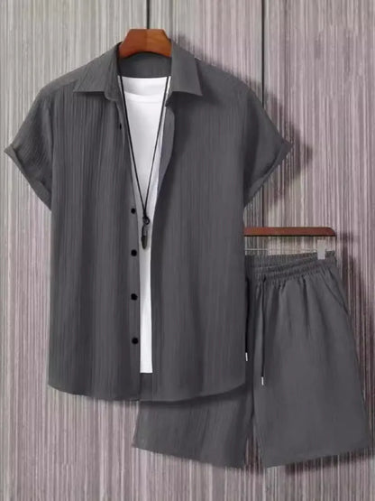 Jacquard short sleeve suit separates in chemical fibre blend polyester with shirt-style jacket and matching shorts