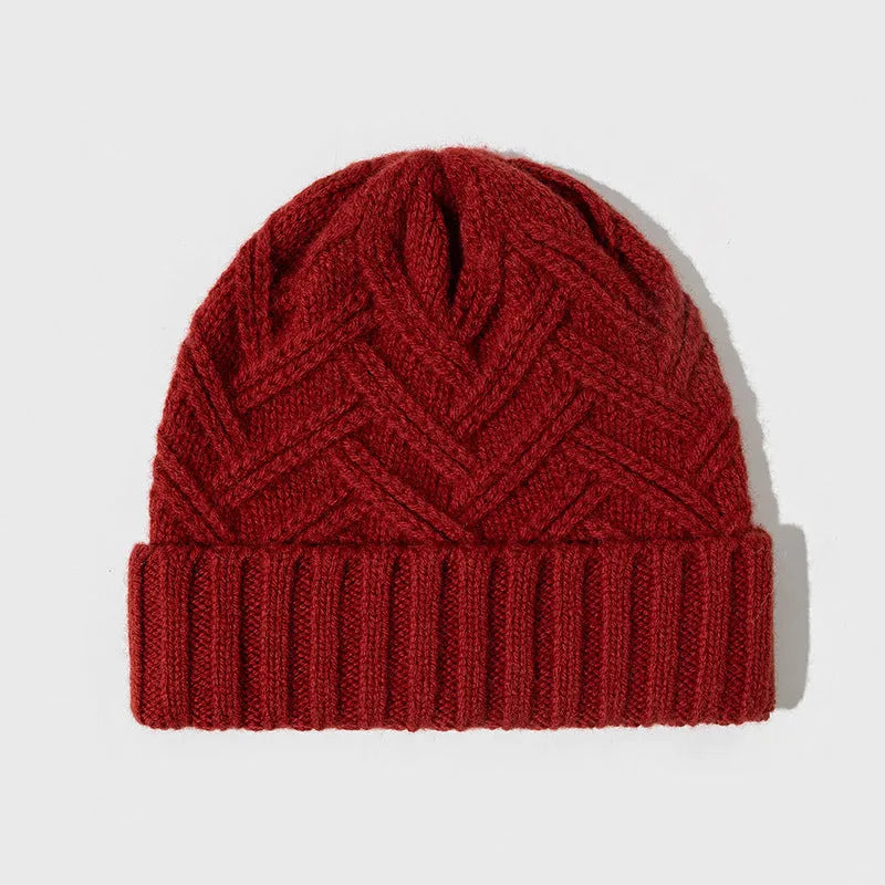 Wool knitted women's hat with dome crown in ankela red colour showing totem pattern details