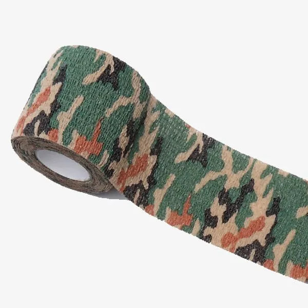 Roll of non-woven elastic camouflage bandage tape in a forest pattern, 4.5 metres long and 5cm wide.