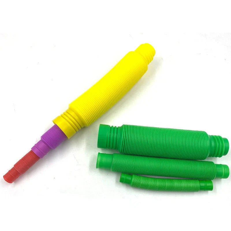 Colorful, flexible sensory fidget tube toy for kids, featuring vibrant colors and customizable shapes to promote creativity and sensory development