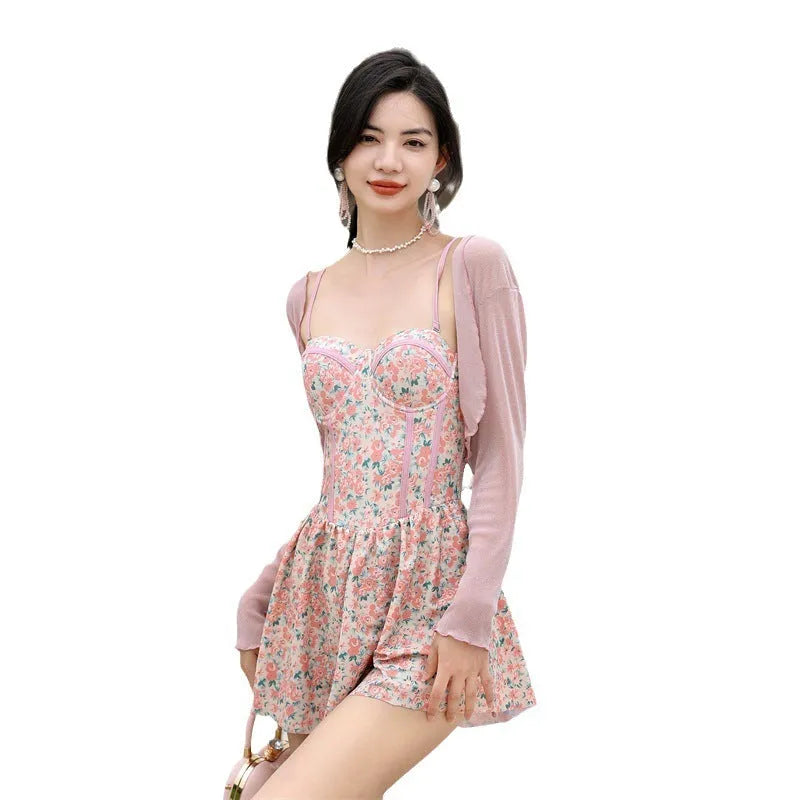 Women's floral jumpsuit swimsuit with adjustable suspender straps in pink or green colour options