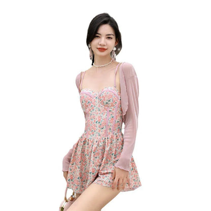 Women's floral jumpsuit swimsuit with adjustable suspender straps in pink or green colour options