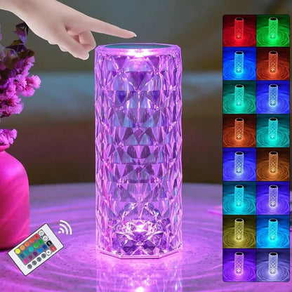 LED crystal table lamp showing 16 colour options with touch controls and remote, measuring 15.8cm high
