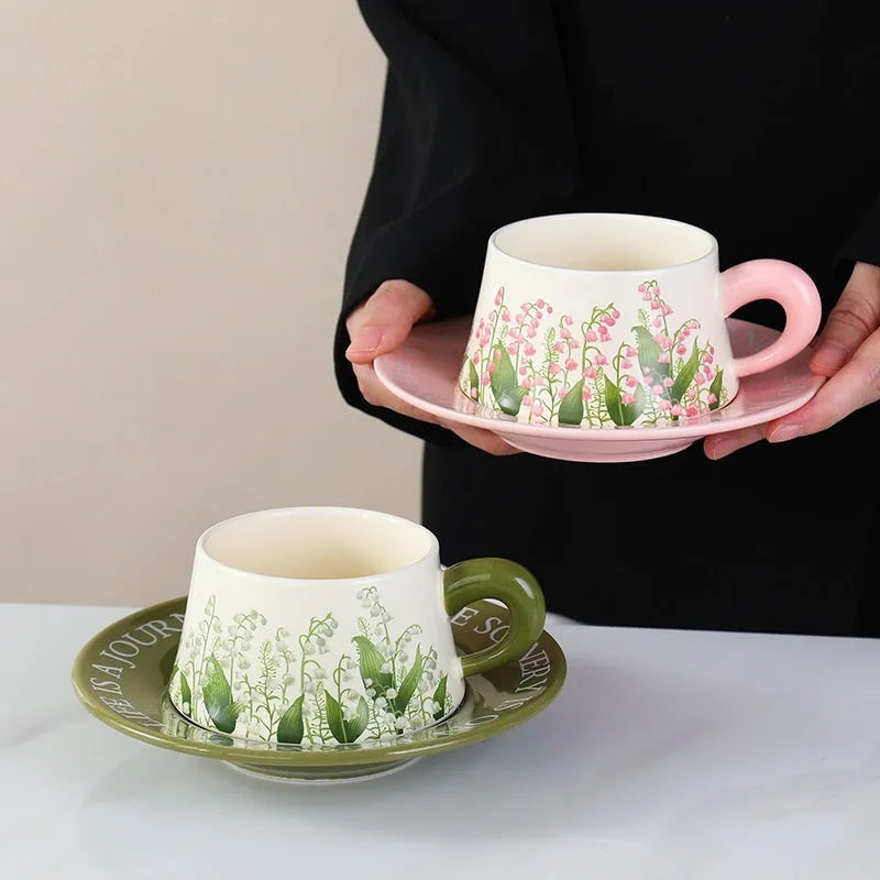 Ceramic coffee cup and saucer set with 300ml capacity, includes two cups, two saucers, two spoons