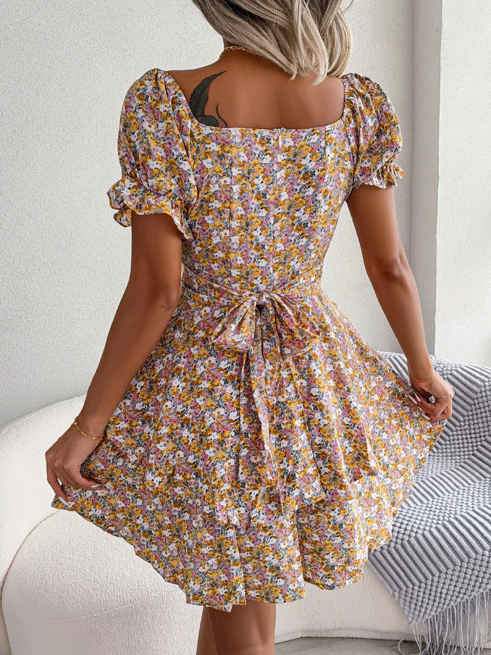 Elegant floral mini dress with A-line silhouette and short sleeves in a variety of vibrant colors