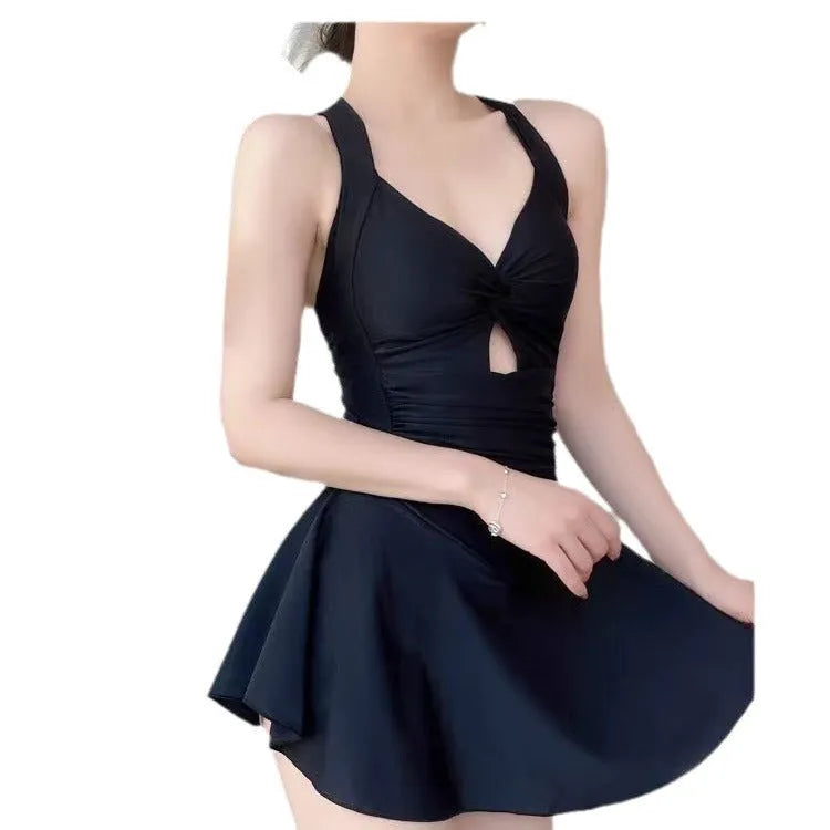 Solid colour one-piece swimsuit for women showing backless conservative design on a mannequin.