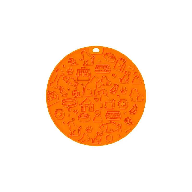 Round blue silicone pet licking mat with textured surface and suction base for slow feeding
