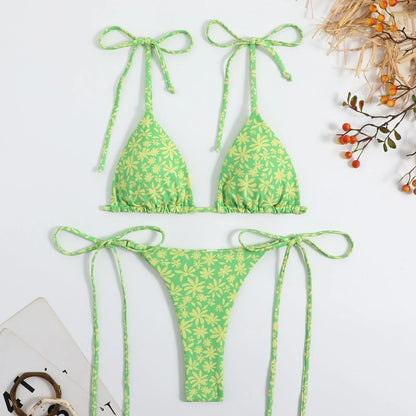 Women's split swimwear bikini set with backless design and floral pattern in available colours