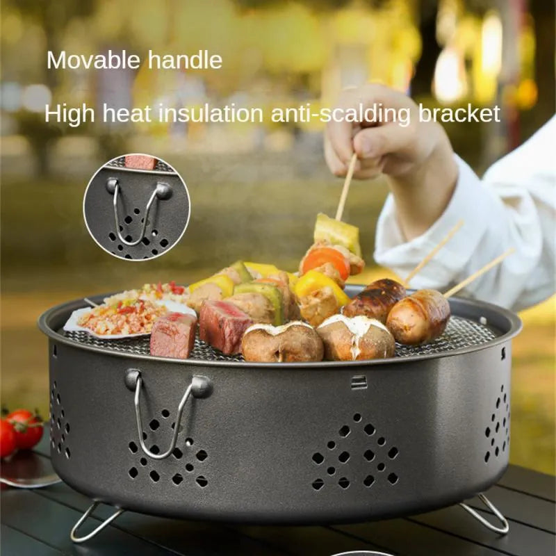 Detachable stainless steel portable barbecue grill with storage bag, shown assembled for outdoor use.