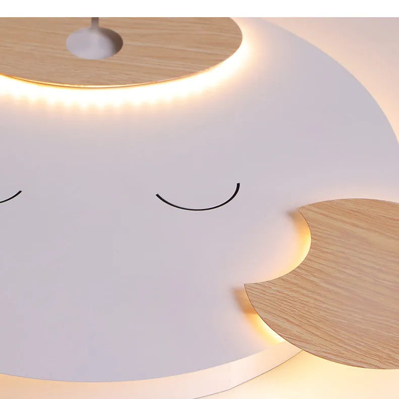 Cartoon bear shaped ceiling lamp with wrought iron frame for a princess themed room.