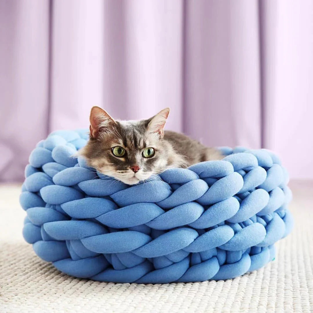 Soft, plush pet bed in various colors and sizes for cats and dogs to sleep comfortably
