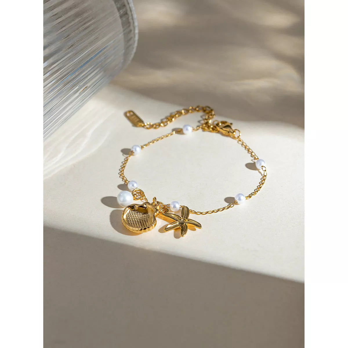 18K gold plated stainless steel bracelet with shell starfish pendant and pearl chain