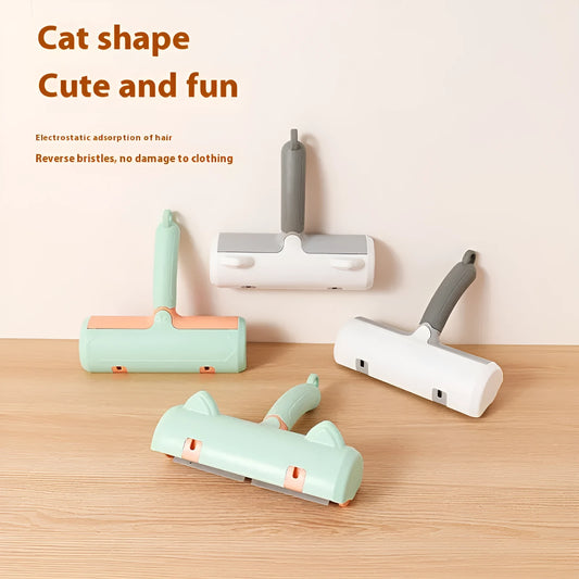 Mint green plastic cat hair removal brush with an ear-style handle on a fabric sofa.