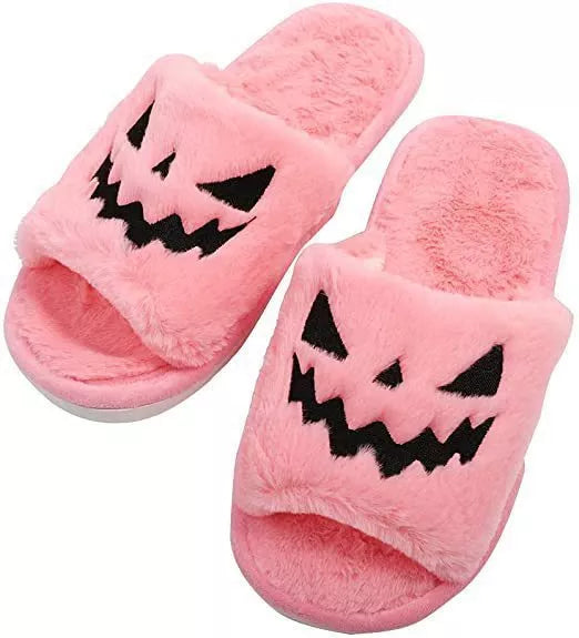 Women's Halloween winter slippers with rabbit fur uppers and PU soles in purple, black, pink, or orange.