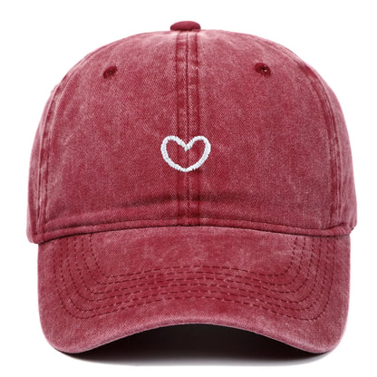 Adjustable cotton baseball cap with embroidered retro love design in various colours.