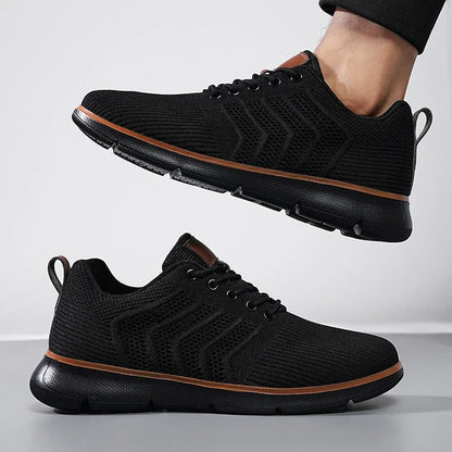Men's black lace-up mesh sneakers with woven detail for casual and sports wear