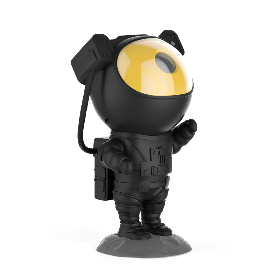 Astronaut-themed galaxy projector with adjustable nebula effects on table showing starry sky projection