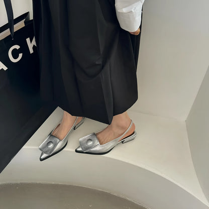 Women's low-heel pointed toe sandals with a back strap in black, brown, apricot, and silver colours.