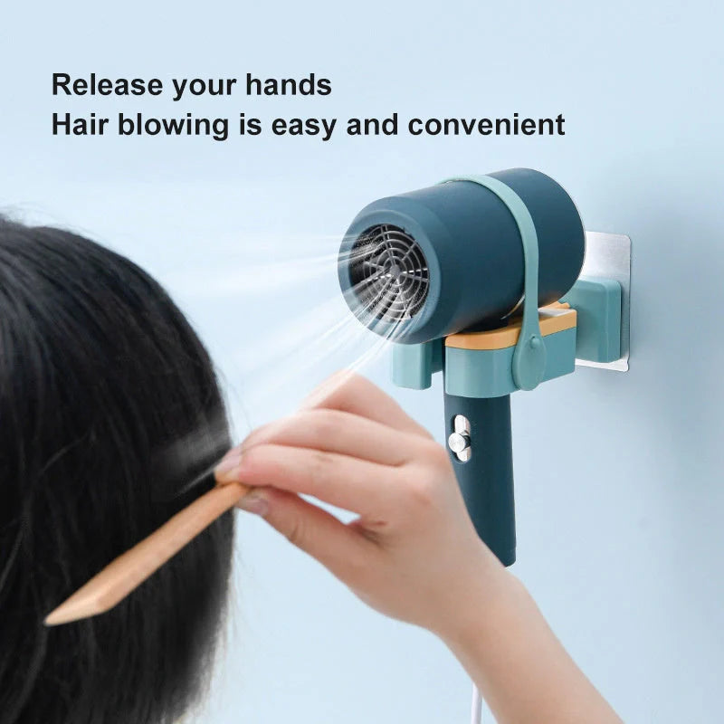 Adjustable wall-mounted hair dryer rack in orange, pink, and green