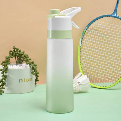 Large plastic spray water bottle with handle strap and leakproof lid in green colour.